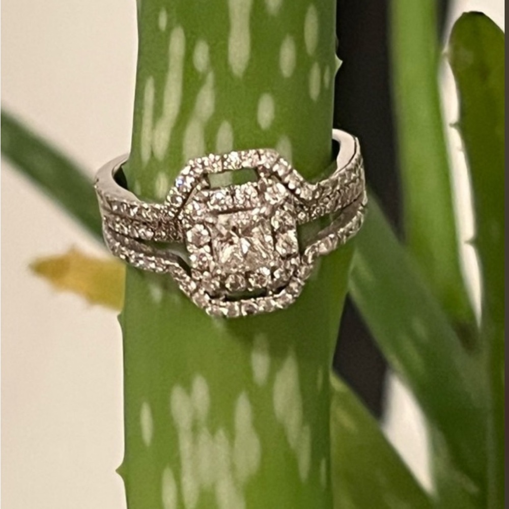18 K white gold and diamond ring. .53 carats of H color, V52 clarity. 1.32 carat